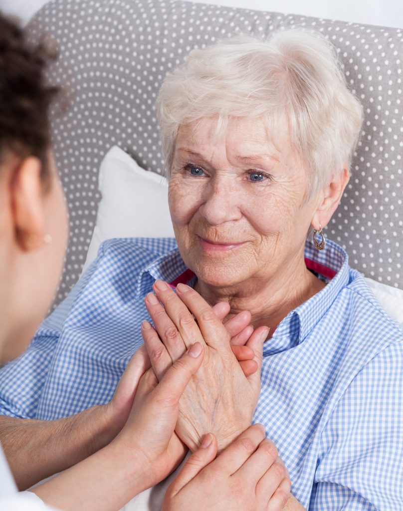 Compassionate touch brings comfort in later life stages.